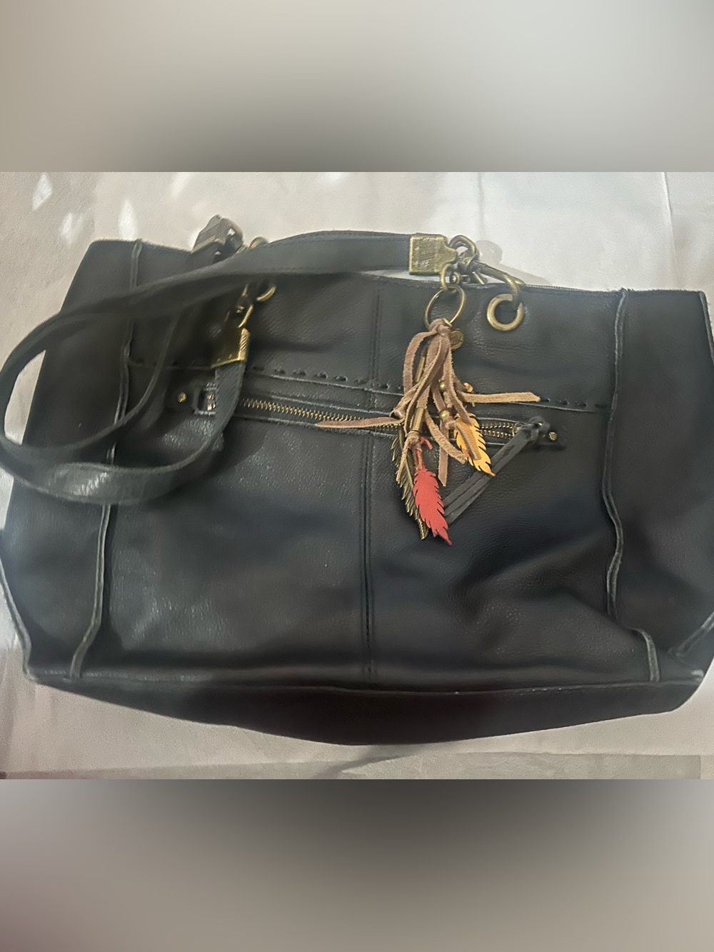 Fossil Black Leather Tote Bag with Feather Tassel Charm